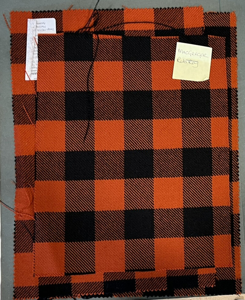 Woven MacGregor Red and Black buffalo check in orange and black.